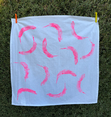 handprinted cotton dish towel with neon pink banana print