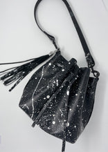 Load image into Gallery viewer, Black Leather Drawstring Bucket Shoulder Bag With Matte White Splatter
