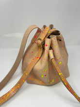 Load image into Gallery viewer, Neon Splatter Veg Tan Leather Drawstring Crossbody Bucket Bag
