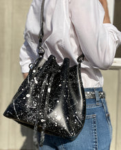 Load image into Gallery viewer, Black Leather Drawstring Bucket Shoulder Bag With Matte White Splatter
