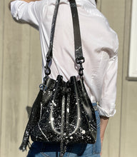 Load image into Gallery viewer, Black Leather Drawstring Bucket Shoulder Bag With Matte White Splatter
